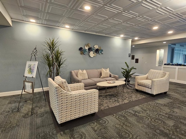 living area featuring recessed lighting, an ornate ceiling, and baseboards