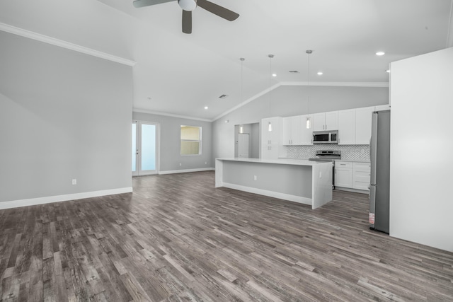 unfurnished living room with dark wood-style floors, baseboards, lofted ceiling, ceiling fan, and ornamental molding