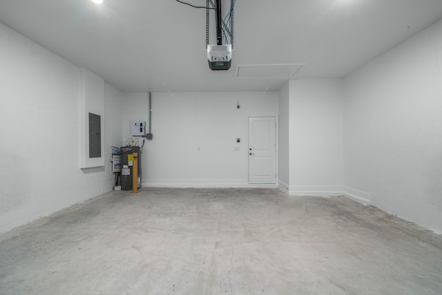 garage featuring electric panel, a garage door opener, and water heater