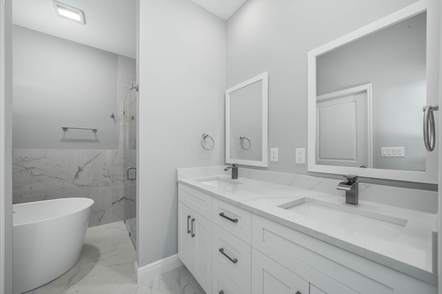 bathroom featuring a sink, a marble finish shower, marble finish floor, and double vanity