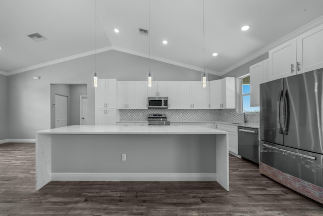 kitchen with dark wood-style floors, visible vents, appliances with stainless steel finishes, and a sink