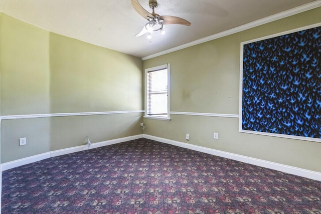 unfurnished room featuring ceiling fan, crown molding, baseboards, and carpet floors