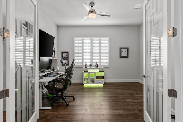 office area with ceiling fan, wood finished floors, a wealth of natural light, and a textured ceiling