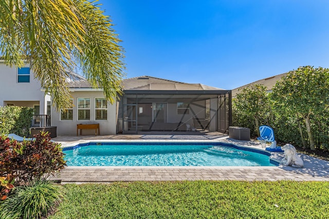 outdoor pool featuring a lanai and a patio