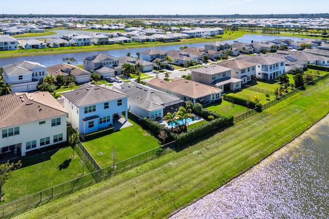 aerial view with a residential view and a water view