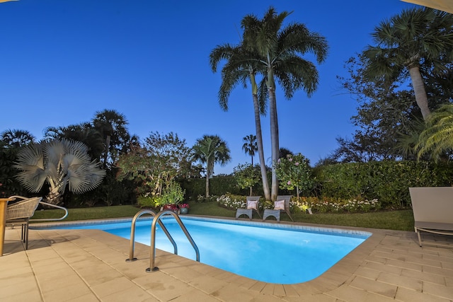 pool with a patio area