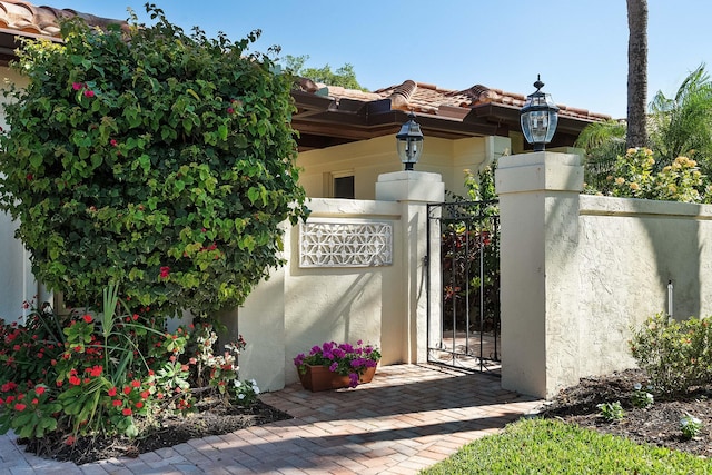 view of gate featuring fence