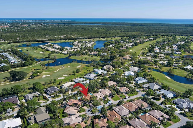 birds eye view of property featuring a residential view, golf course view, a forest view, and a water view