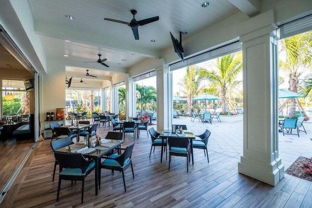 exterior space with ceiling fan, outdoor dining area, and a deck