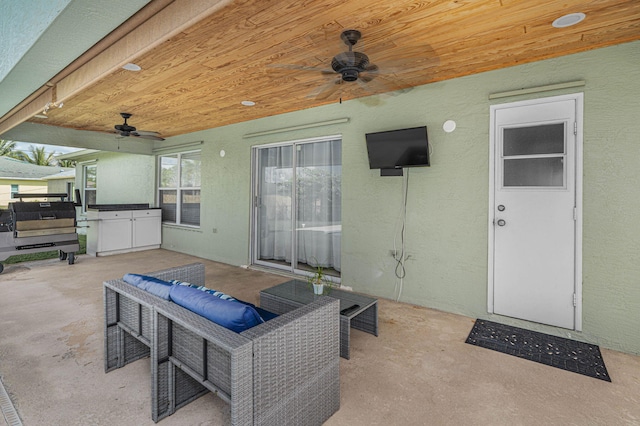 view of patio featuring an outdoor hangout area and ceiling fan