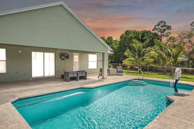 view of pool featuring a patio, fence private yard, and a fenced in pool