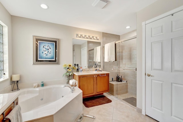 full bath with vanity, visible vents, a whirlpool tub, a shower stall, and tile patterned floors