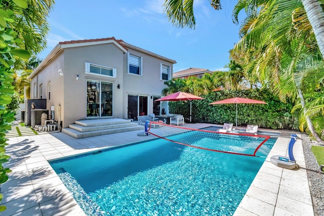 pool featuring a patio