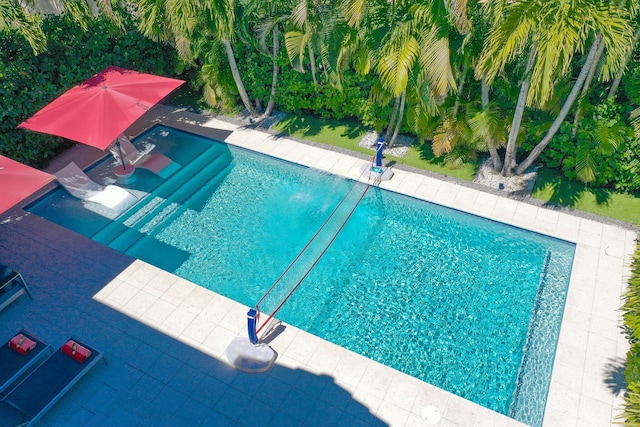 outdoor pool featuring a patio area