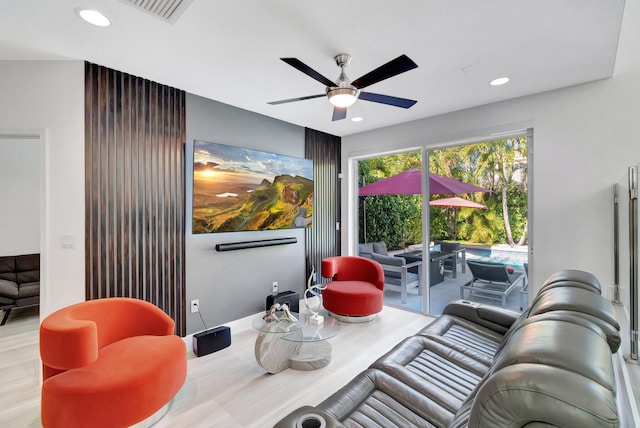 living room featuring wood finished floors, recessed lighting, visible vents, and ceiling fan