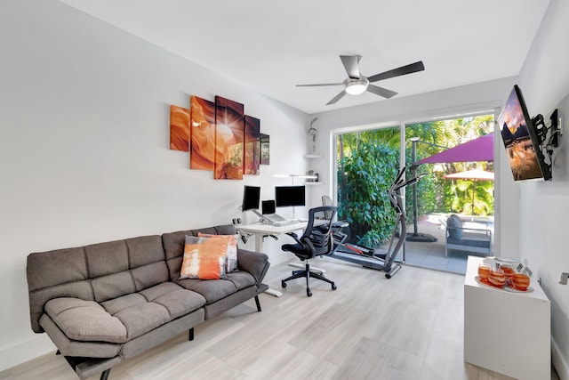 office area with wood finished floors and a ceiling fan