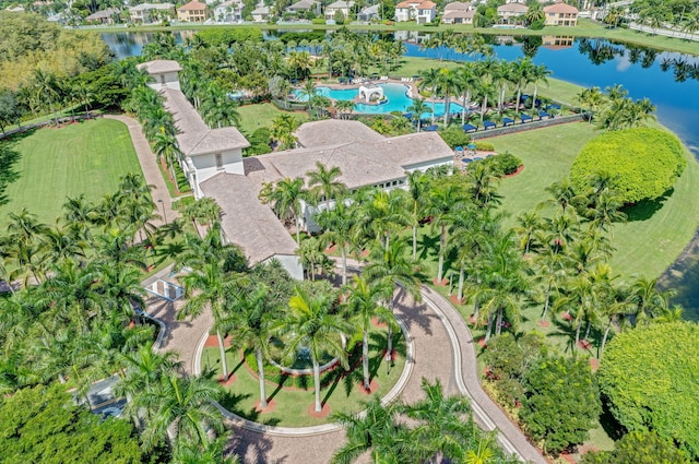 drone / aerial view featuring a residential view and a water view