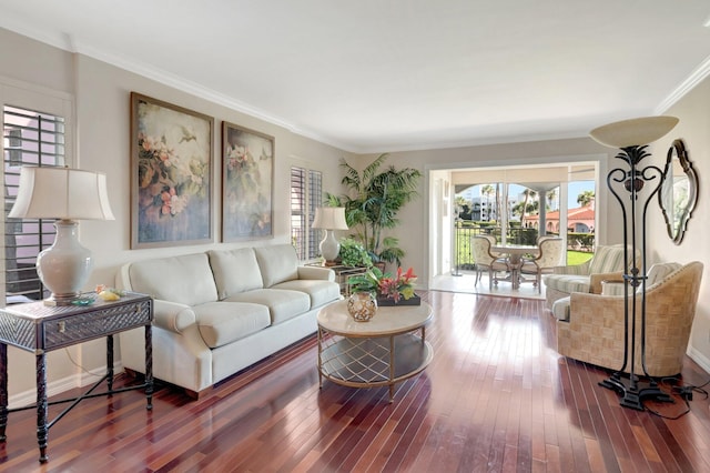 living area featuring hardwood / wood-style floors and ornamental molding