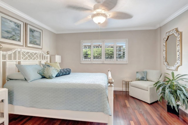 bedroom with ornamental molding, a ceiling fan, baseboards, and hardwood / wood-style flooring