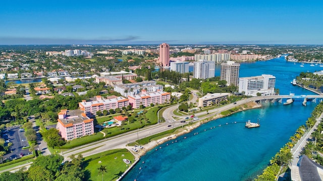 drone / aerial view with a view of city and a water view