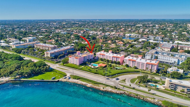 bird's eye view featuring a water view and a city view