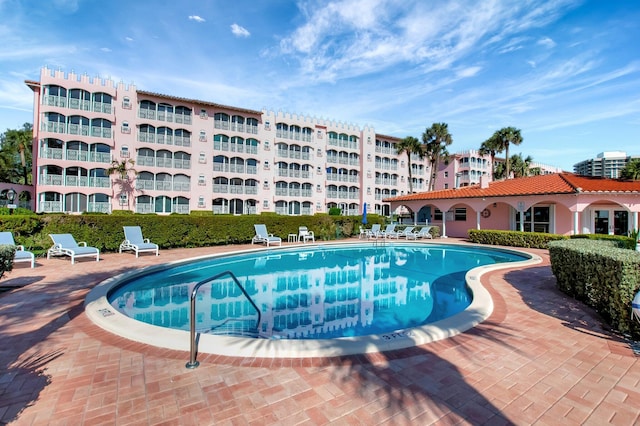 pool with a patio