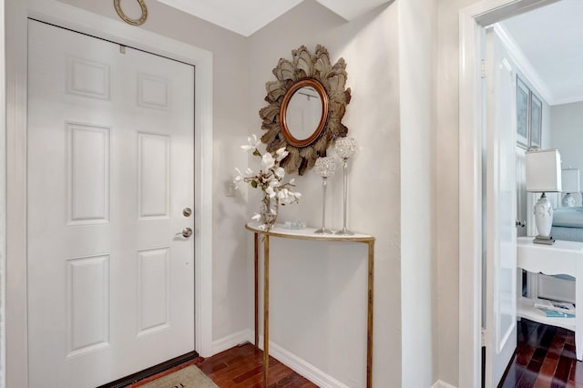 entryway featuring dark wood-type flooring and baseboards