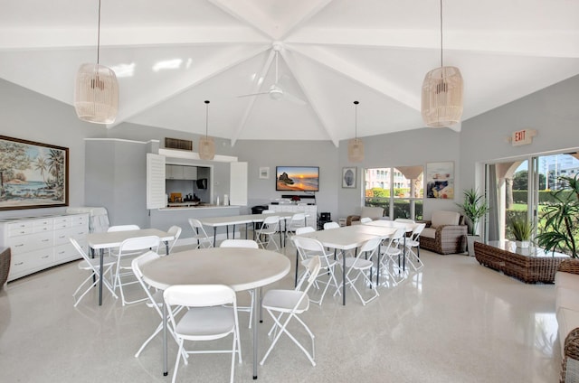 dining room featuring beam ceiling, visible vents, and high vaulted ceiling