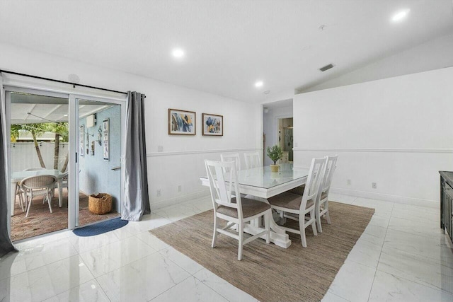 dining room featuring baseboards, visible vents, lofted ceiling, recessed lighting, and marble finish floor