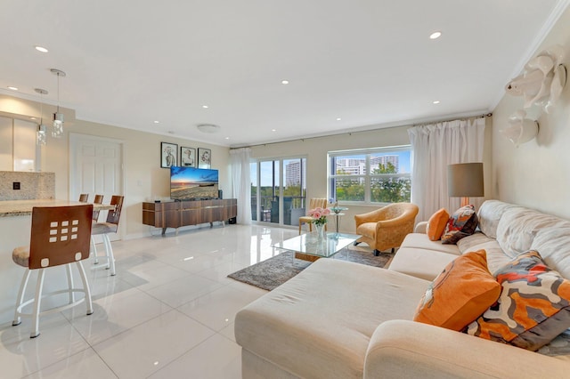 living area with light tile patterned flooring and recessed lighting