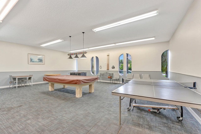 game room with pool table, a textured ceiling, baseboards, and carpet floors