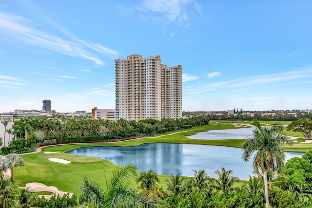 property view of water with a city view and view of golf course