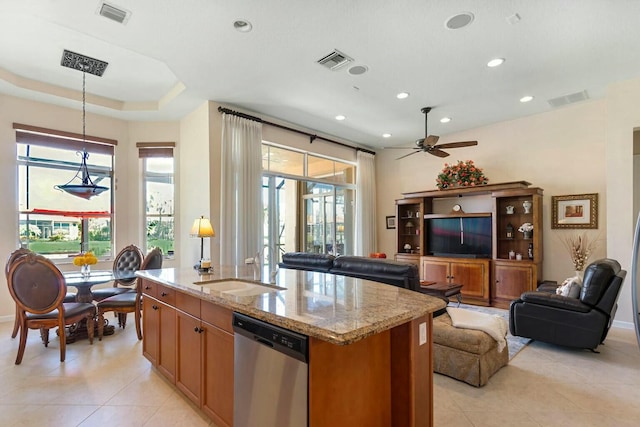 kitchen with dishwasher, open floor plan, and visible vents