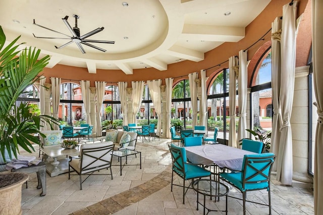 sunroom / solarium with beamed ceiling