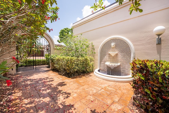 view of patio / terrace with a gate