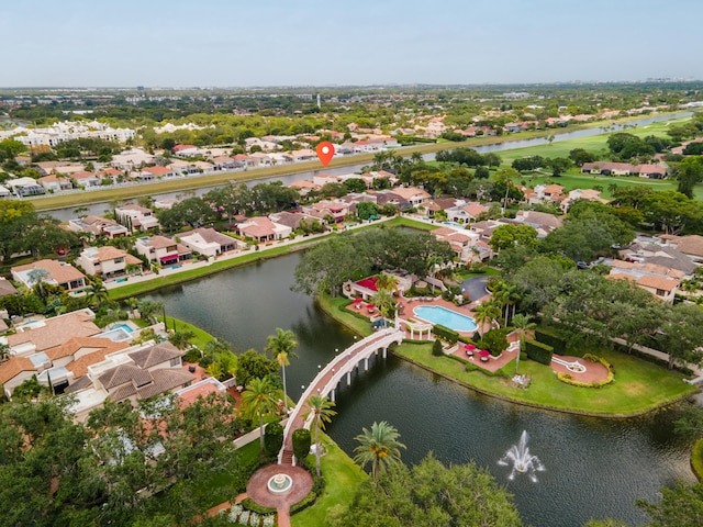 birds eye view of property with a residential view and a water view