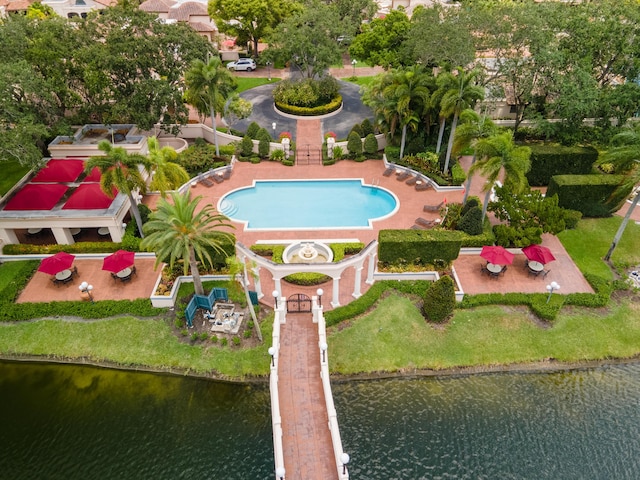 birds eye view of property featuring a water view