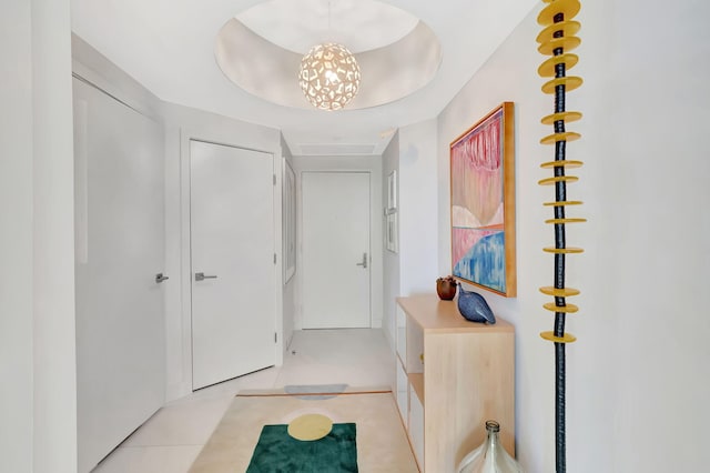 foyer entrance featuring light tile patterned floors