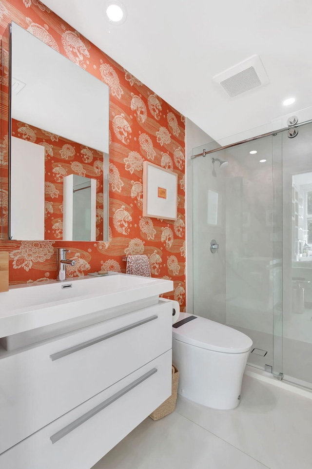 bathroom featuring vanity, visible vents, wallpapered walls, a shower stall, and toilet