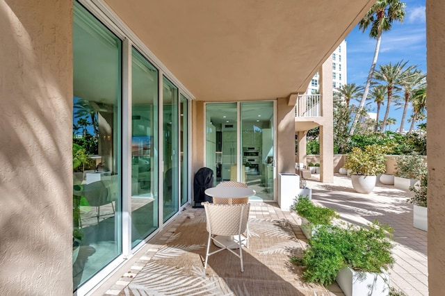 view of patio / terrace with a balcony