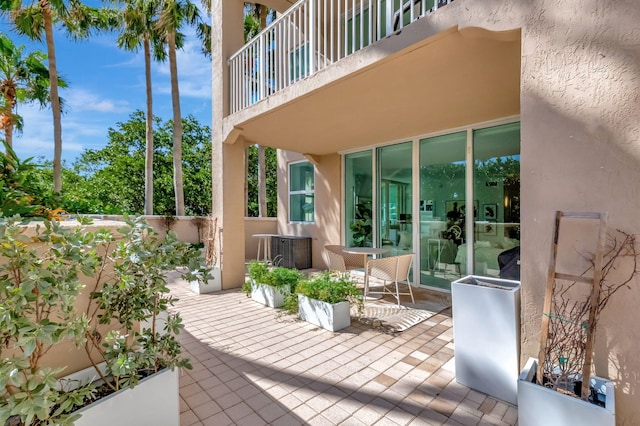 view of patio with a balcony