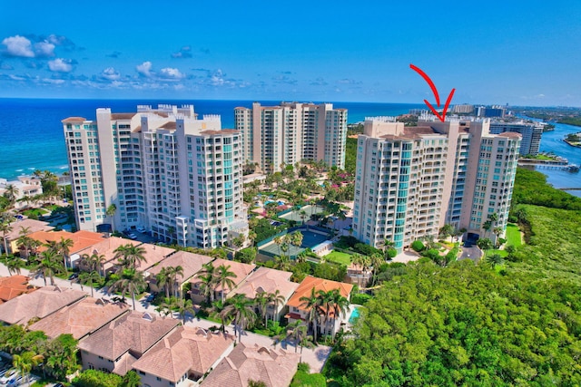 bird's eye view featuring a water view and a city view