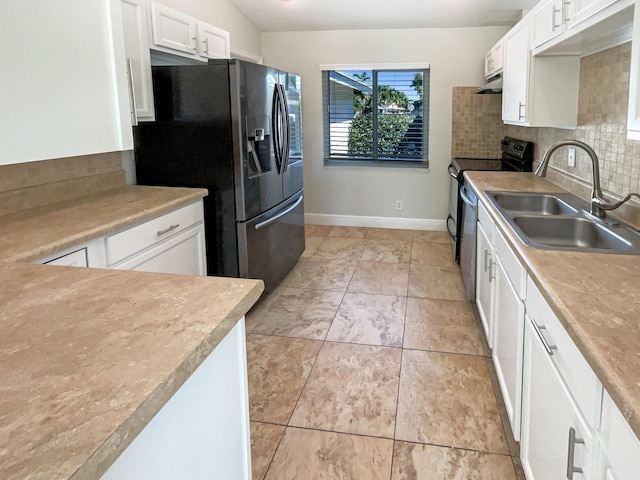 kitchen with fridge with ice dispenser, a sink, range with electric stovetop, white cabinets, and decorative backsplash