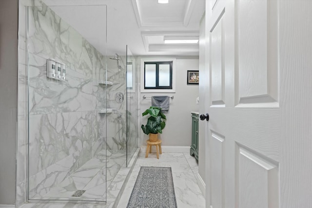 bathroom with a tray ceiling, baseboards, marble finish floor, and a marble finish shower