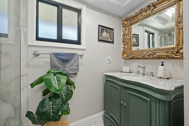 bathroom featuring vanity and baseboards