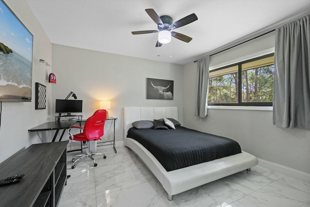 bedroom featuring marble finish floor, baseboards, and ceiling fan