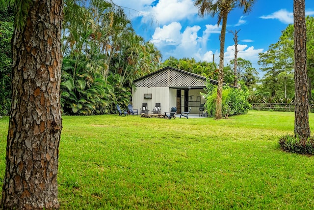 view of yard with a patio and fence