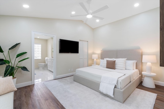17393 84th Ct N, Loxahatchee, FL 33470 - bedroom featuring vaulted ceiling, wood finished floors, baseboards, ensuite bath, and recessed lighting