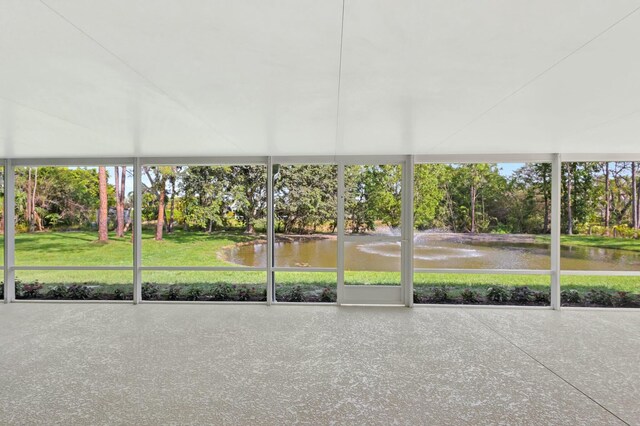 17393 84th Ct N, Loxahatchee, FL 33470 - unfurnished sunroom featuring a water view and view of scattered trees