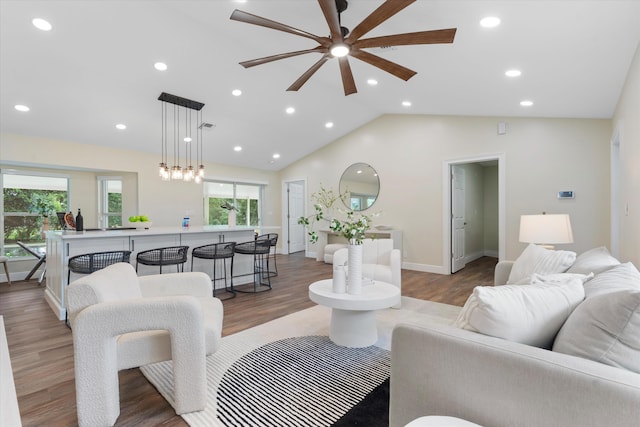 17393 84th Ct N, Loxahatchee, FL 33470 - living room with plenty of natural light, ceiling fan, light wood-style flooring, recessed lighting, and vaulted ceiling